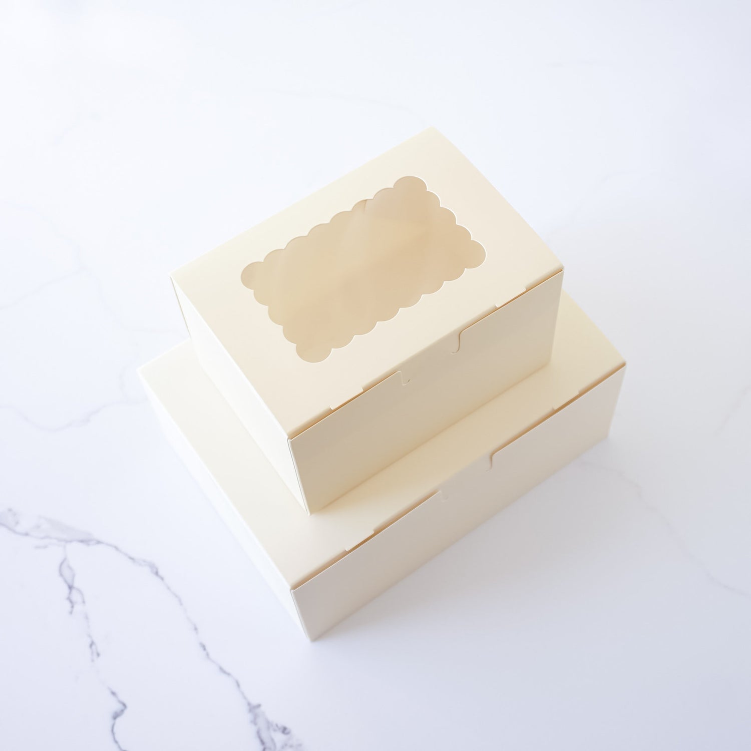 ivory bakery box with scalloped window