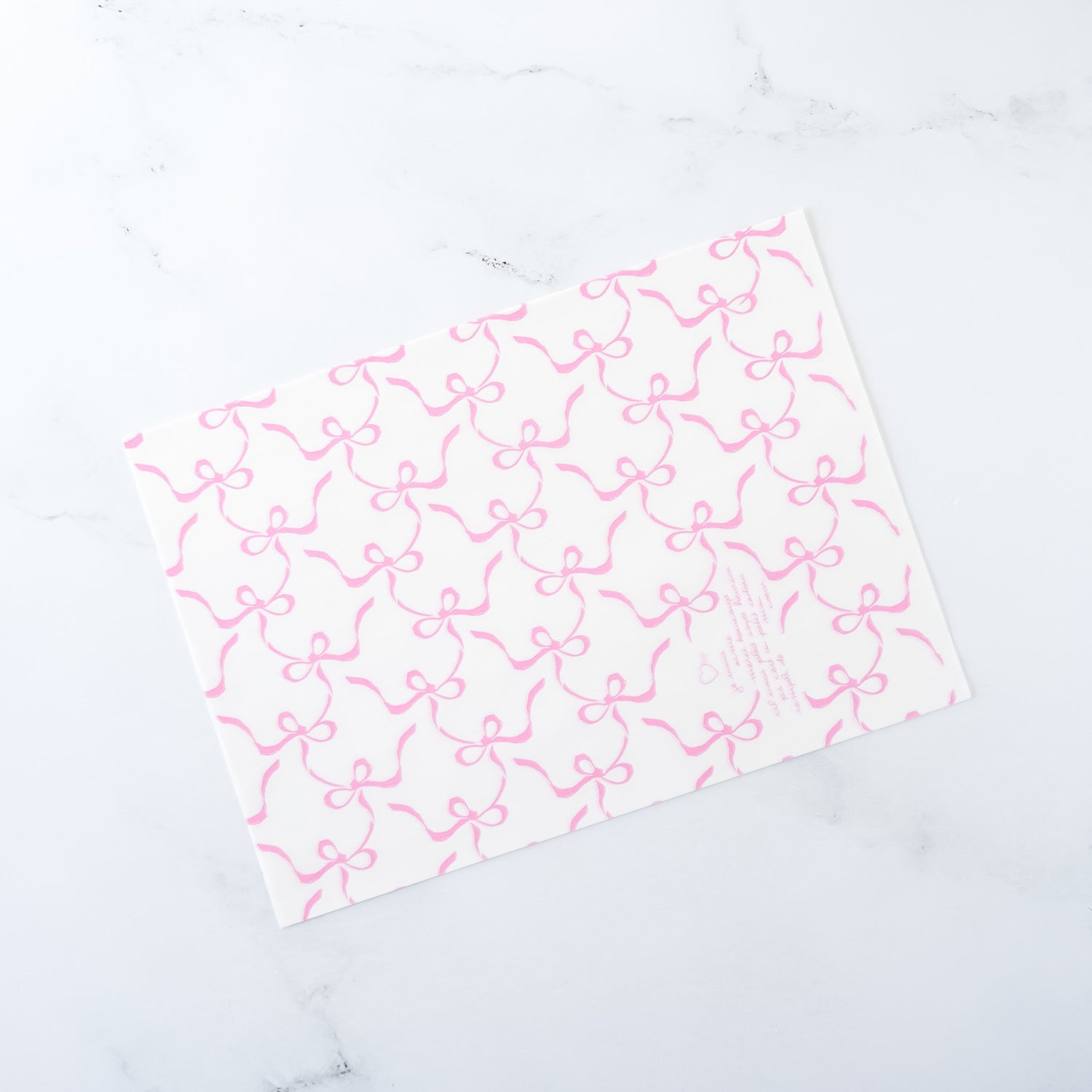 pink ribbon bow wrapping paper