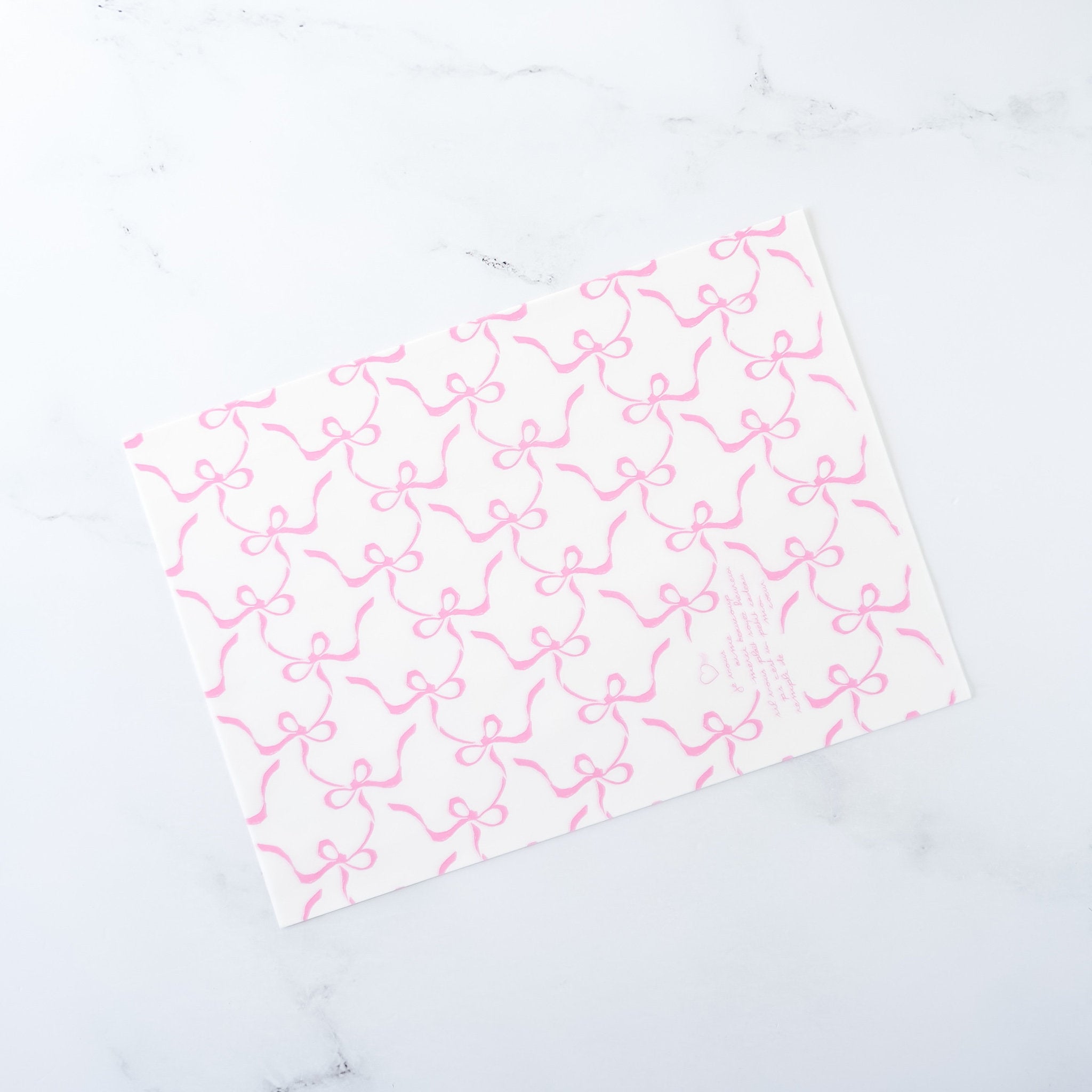 pink ribbon bow wrapping paper