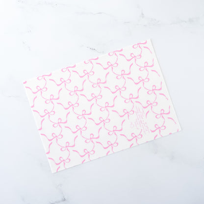 pink ribbon bow wrapping paper