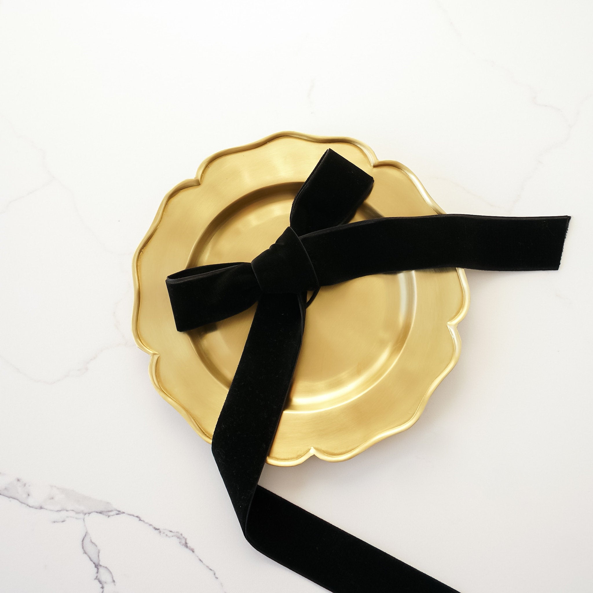 ruffled edge antique brass tray, black ribbon